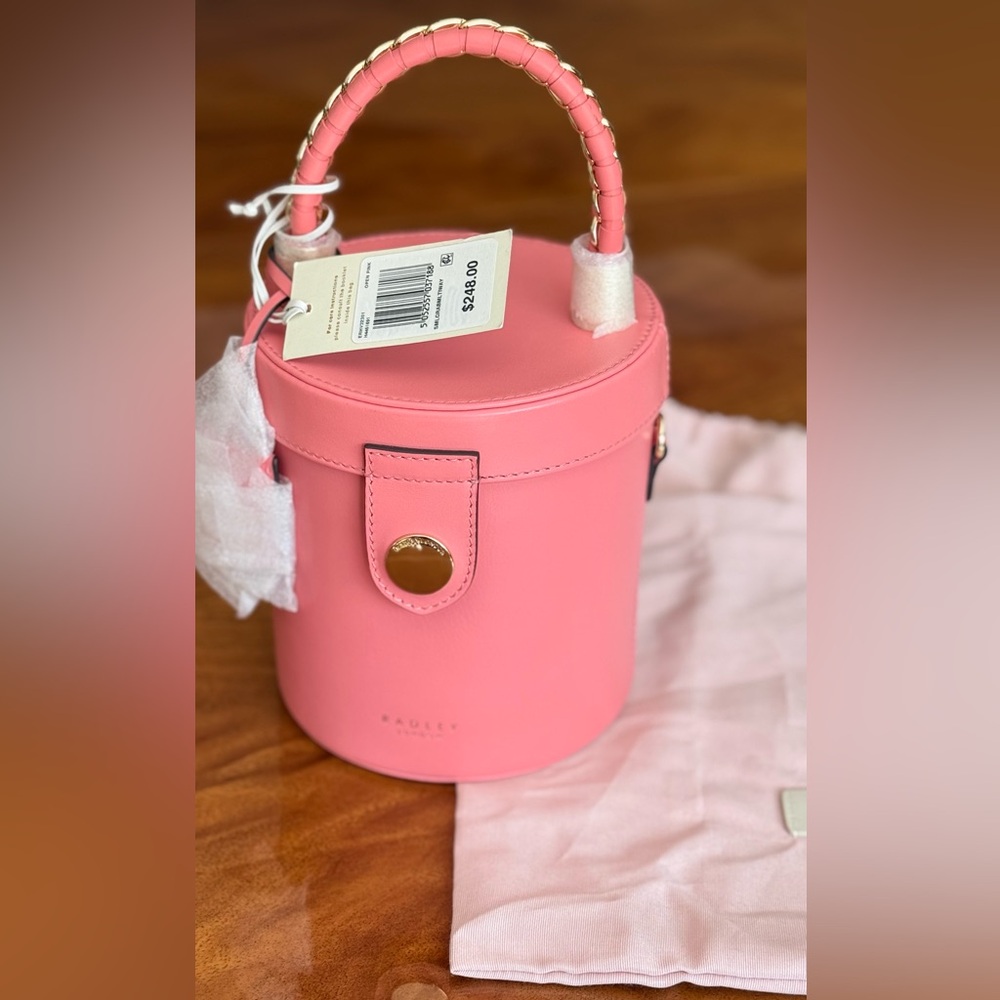 Radley London 💓Elegant Pink Cylinder Handbag with tags but has a tiny scratch